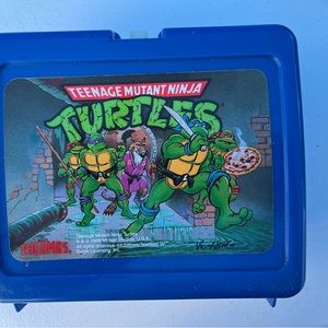 Vintage Teenage Mutant Ninja Turtles plastic lunchbox with thermos